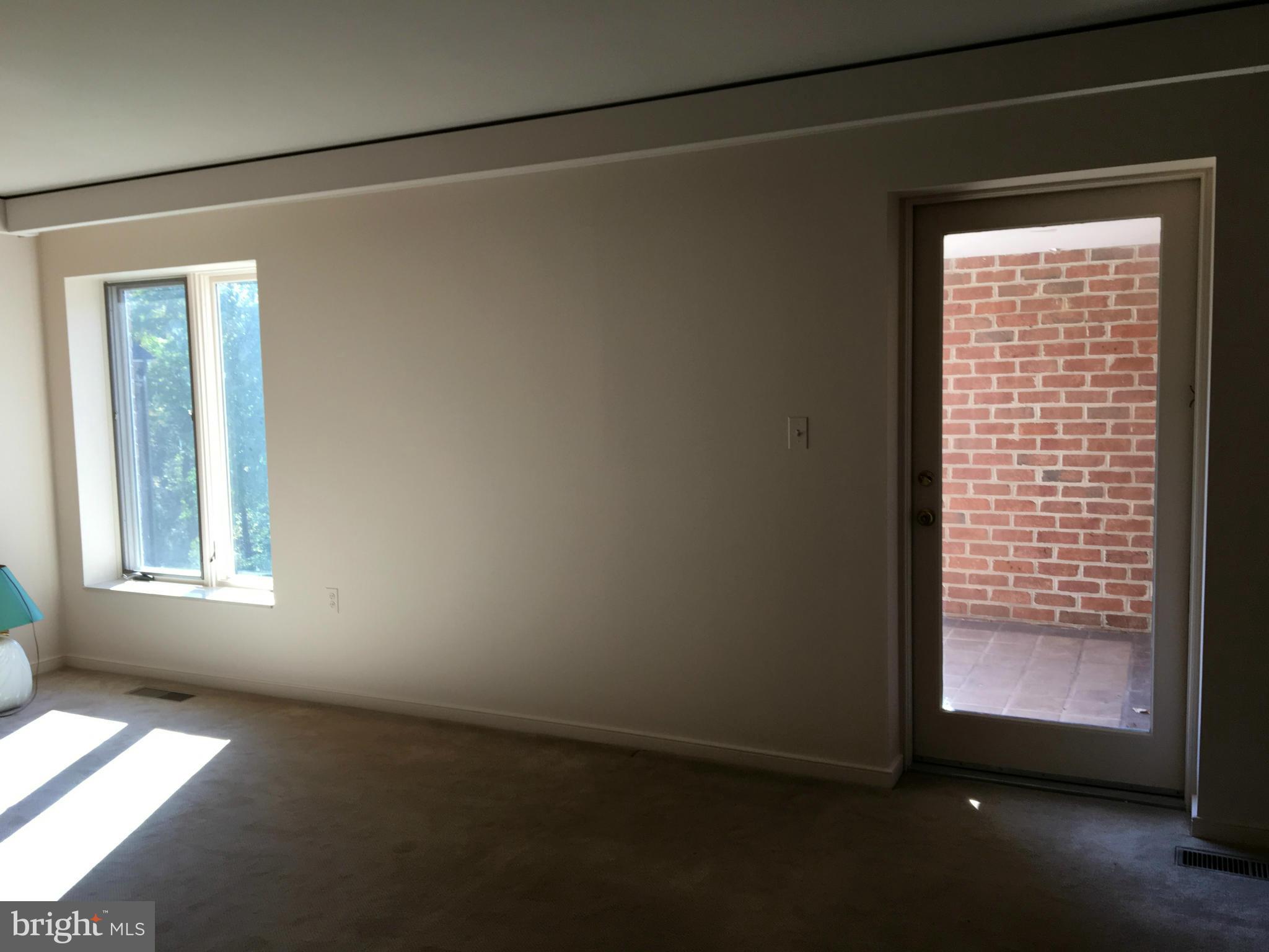 2331 Old Court Road, Unit 400 Baltimore, MD 21208 - Photo 17 of 27 a view of empty room with window