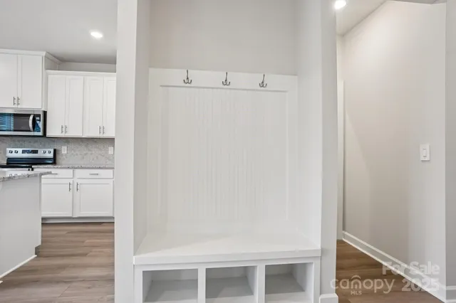 a view of cabinets and wooden floor
