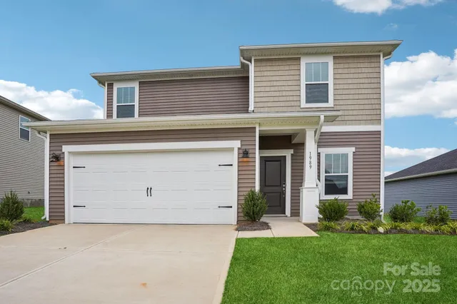 front view of a house and a yard