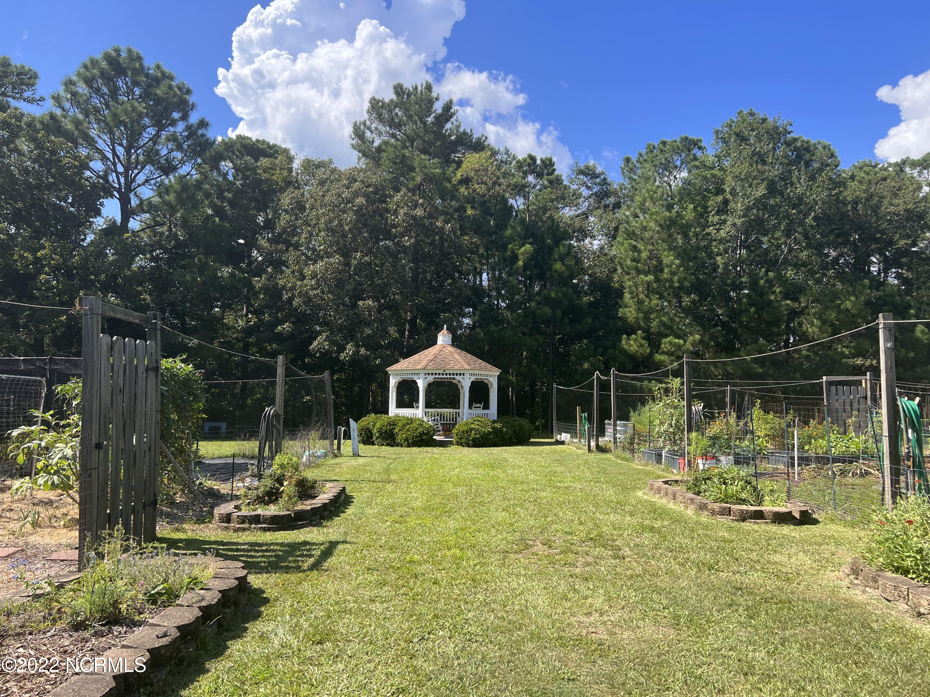 403 Cypress Ridge Drive Southeast Bolivia, NC 28422 - Photo 6 of 11 Gazebo in Community Garden