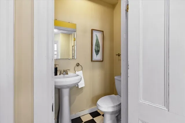 a bathroom with a sink and toilet