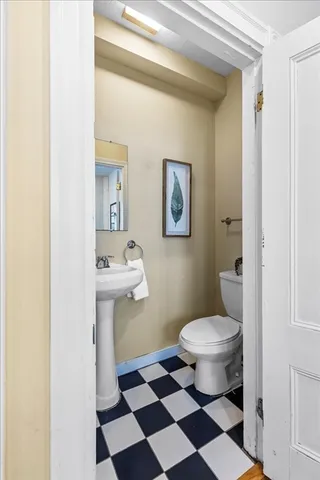 a bathroom with a sink and a toilet