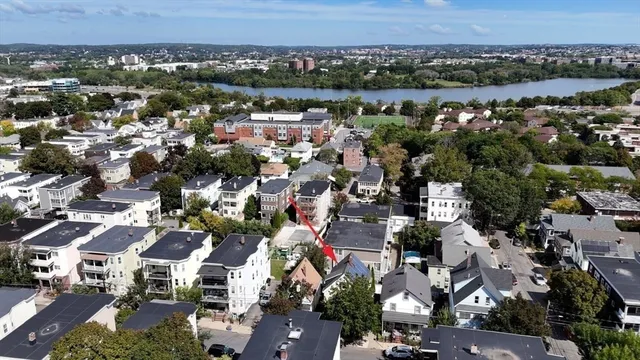 an aerial view of a city with lots of residential buildings