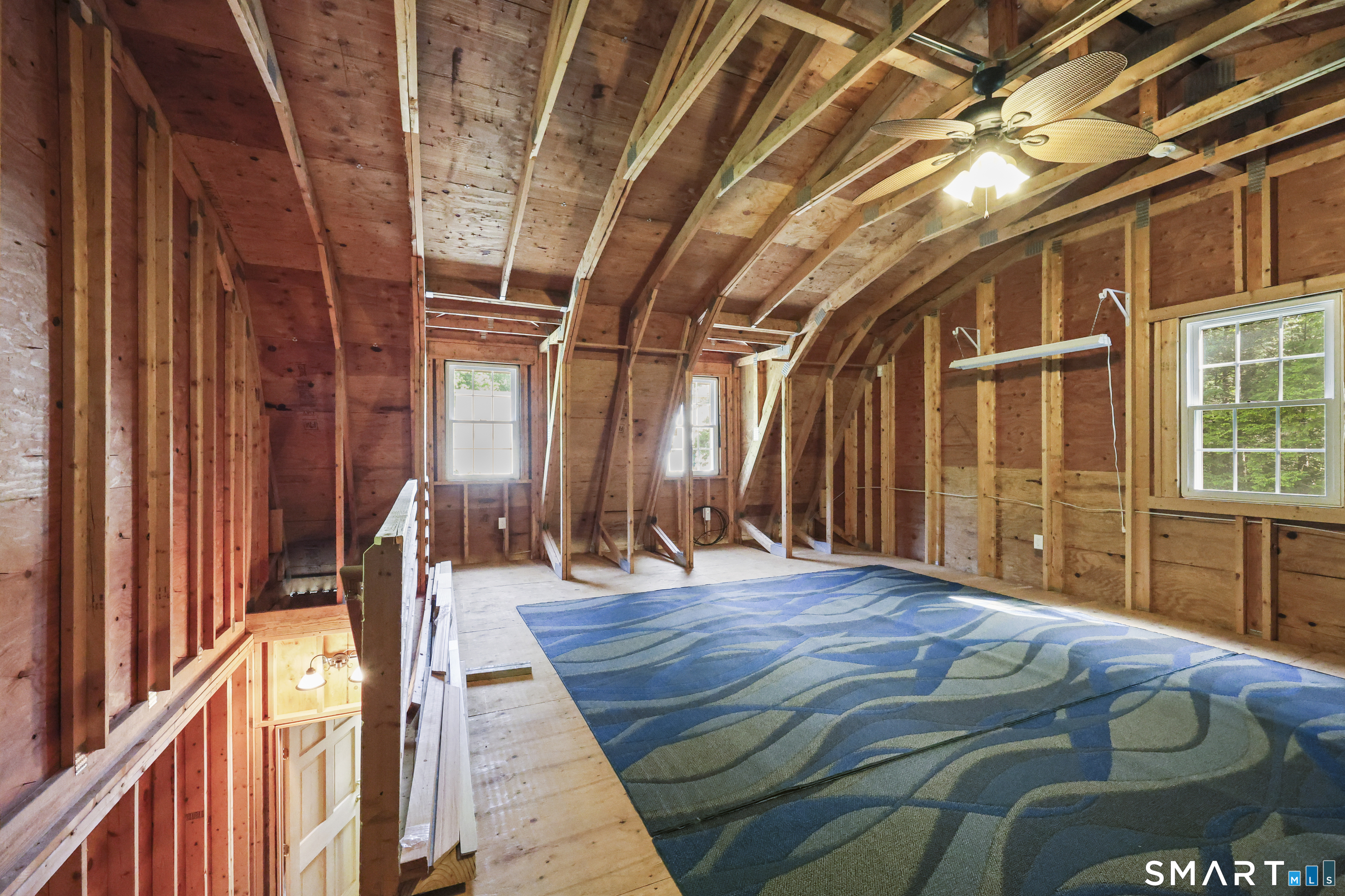 17 Briar Hill Road Avon, CT 06001 - Photo 21 of 38 Carriage house outbuilding 2nd floor which has endless possibilities for use. Features 4 insulated windows with screens. Has its own electrical panel and lots of sunlight.