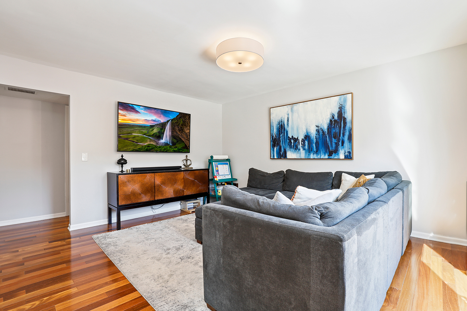 350 Pearson Circle Naperville, IL 60563 - Photo 9 of 32 a living room with furniture and a flat screen tv