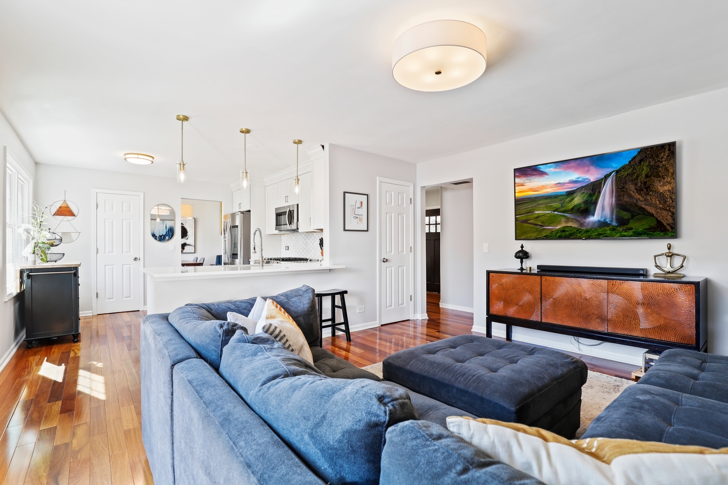 350 Pearson Circle Naperville, IL 60563 - Photo 10 of 32 a living room with furniture and a flat screen tv