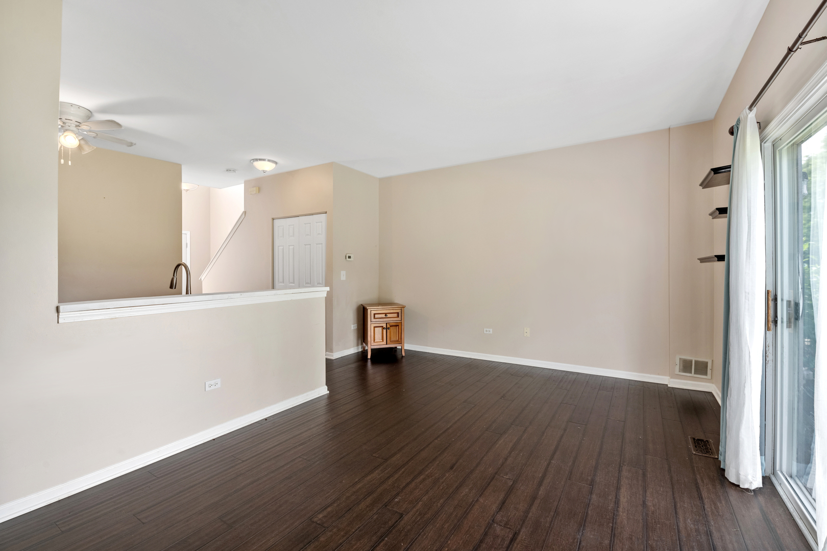 2427 Oak Tree Lane Plainfield, IL 60586 - Photo 18 of 24 a view of a room with wooden floor and a sink