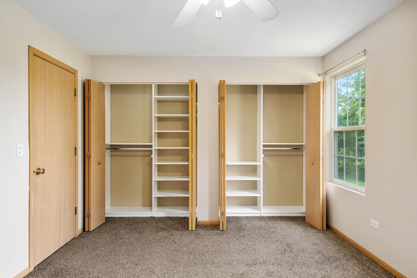 2427 Oak Tree Lane Plainfield, IL 60586 - Photo 20 of 24 a view of an empty room with a window