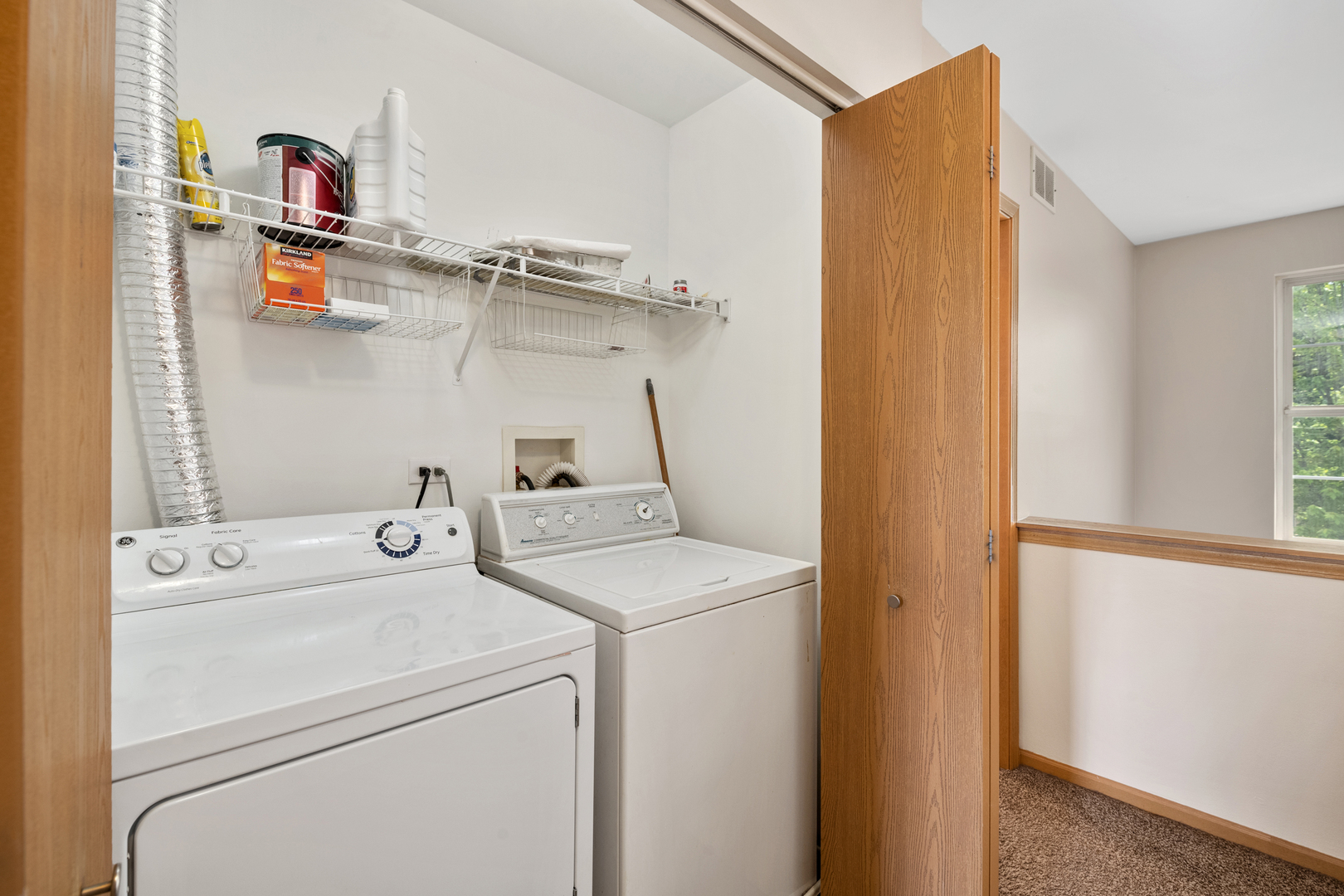 2427 Oak Tree Lane Plainfield, IL 60586 - Photo 22 of 24 a utility room with dryer and washer