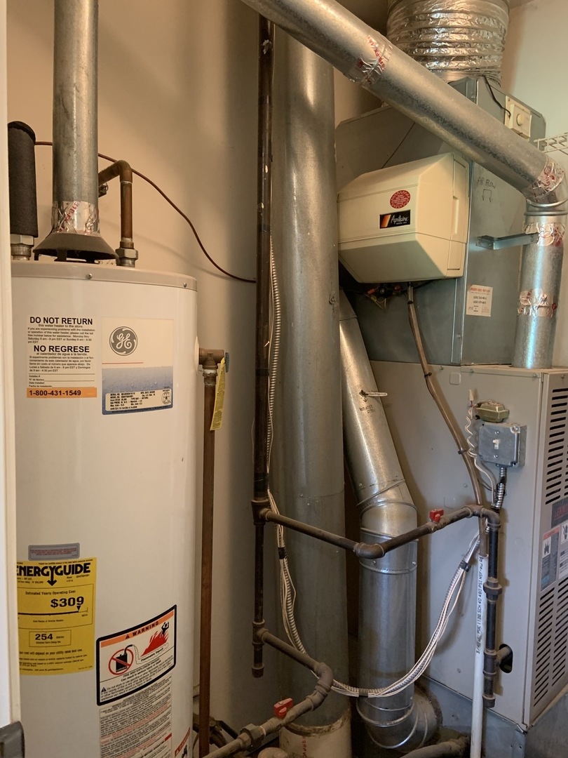 2427 Oak Tree Lane Plainfield, IL 60586 - Photo 24 of 24 a utility room with dryer and washer