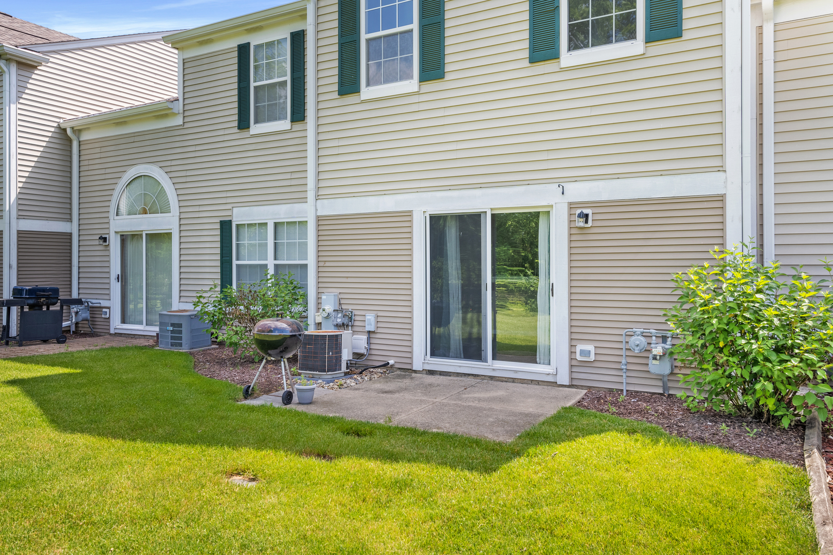 2427 Oak Tree Lane Plainfield, IL 60586 - Photo 4 of 24 a view of a house with backyard porch and sitting area