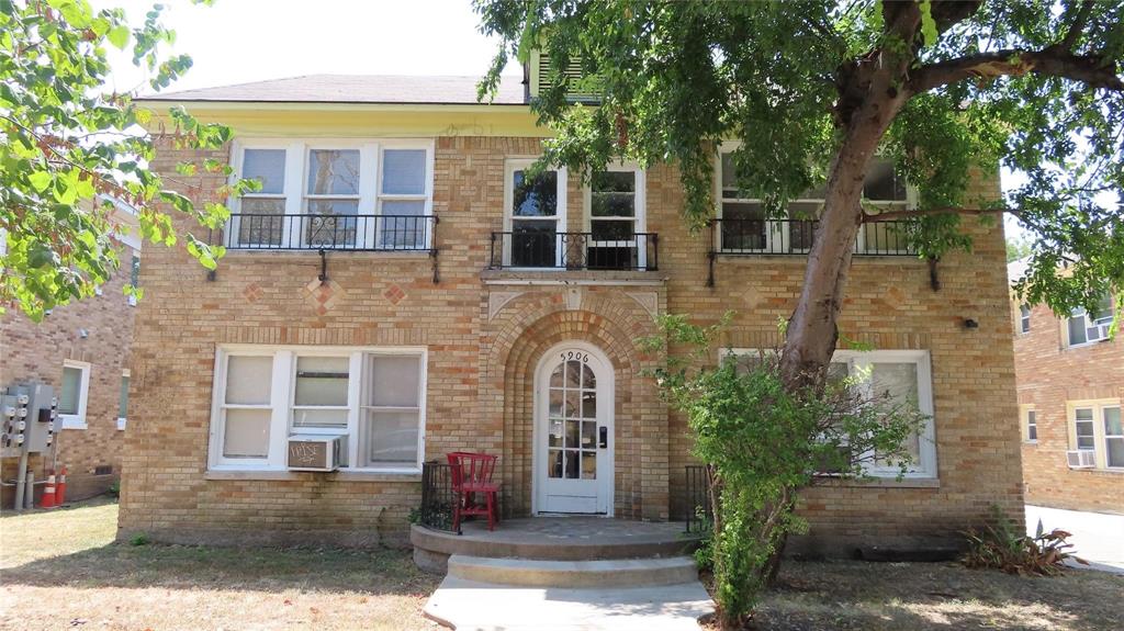 5906 Oram Street, Unit 3 Dallas, TX 75206 - Photo 1 of 10 a front view of a house with garden