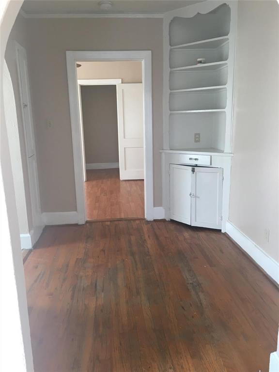 5906 Oram Street, Unit 3 Dallas, TX 75206 - Photo 6 of 10 a view of empty room with empty racks