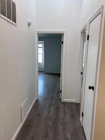 a bathroom with a toilet a sink and shower