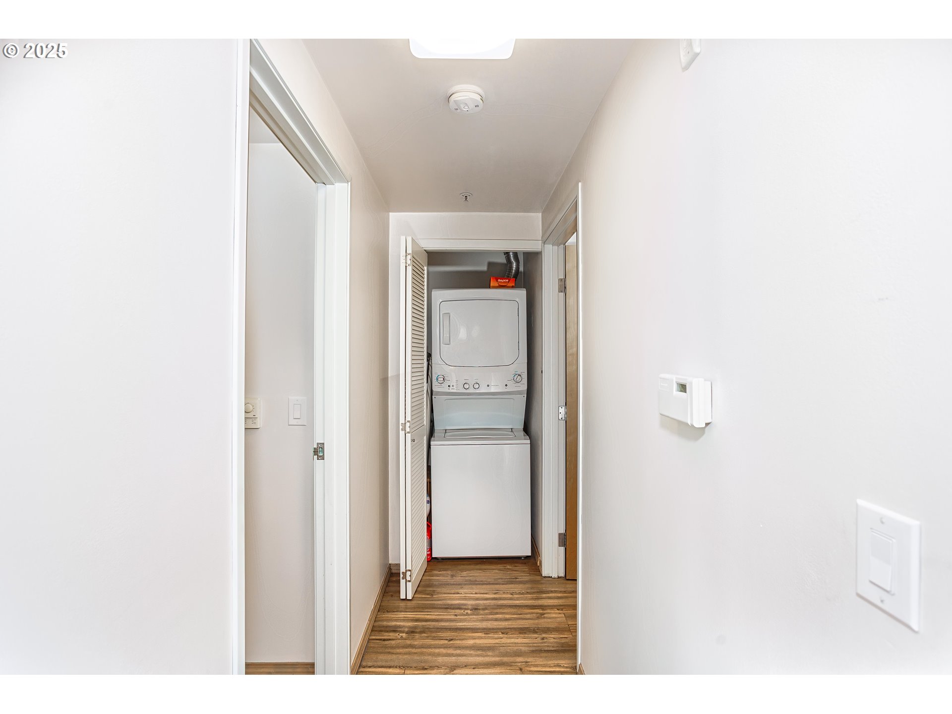 701 Columbia Street, Unit 702 Vancouver, WA 98660 - Photo 5 of 19 a view of a living room with a wooden floor