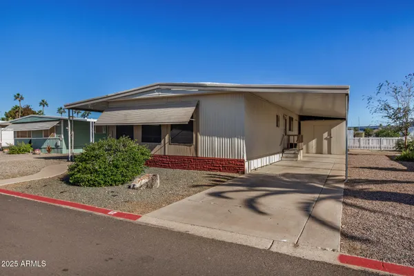 a front view of a house with a garage