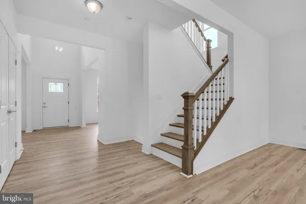 a view of kitchen with wooden floor