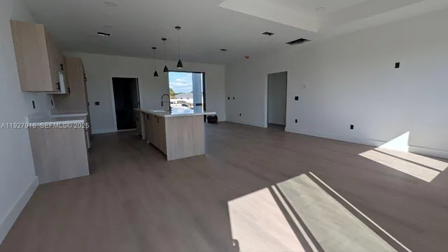 a view of kitchen and utility room