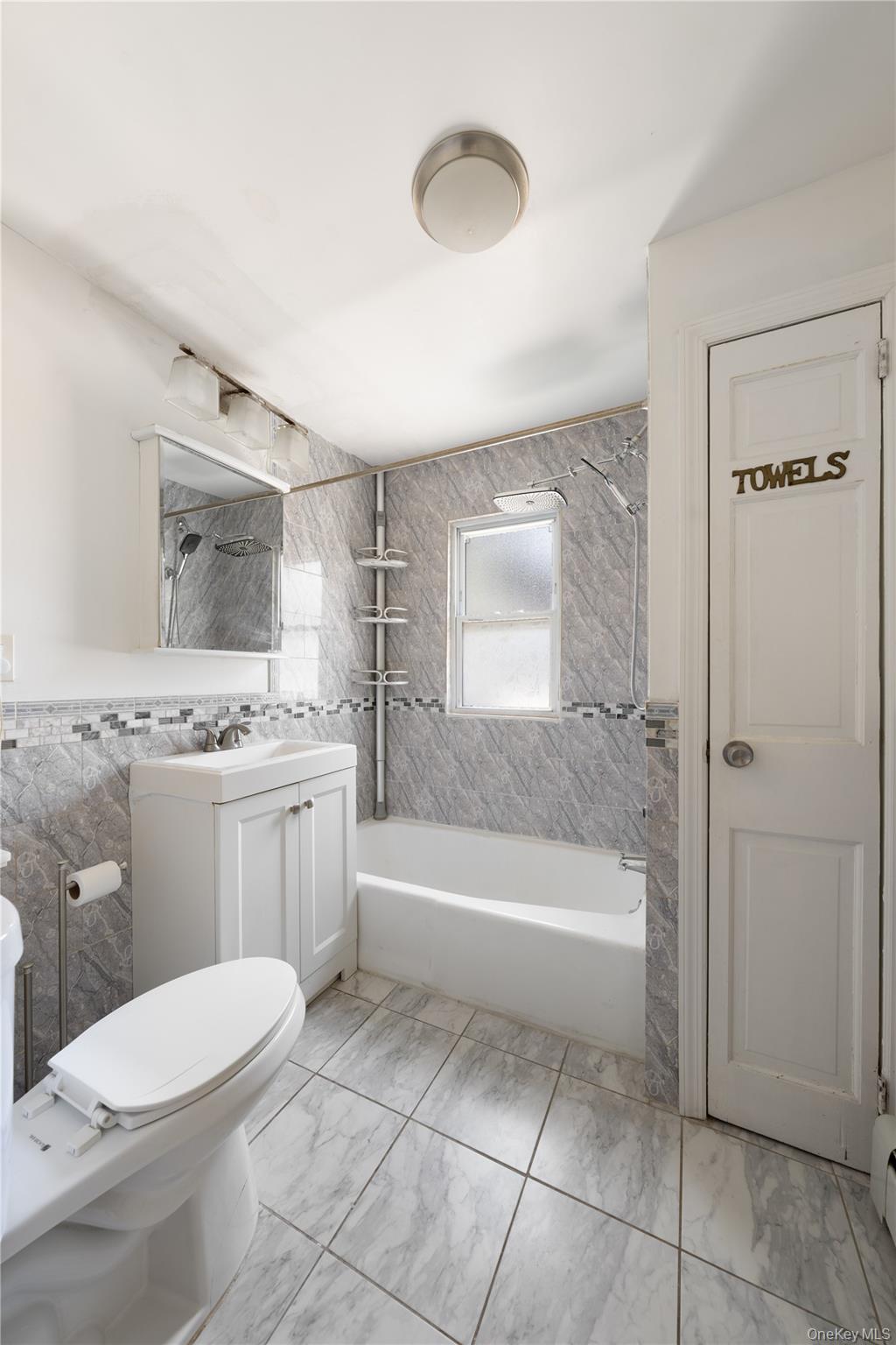 29-10 Butler Street Queens, NY 11369 - Photo 10 of 41 1st floor bath