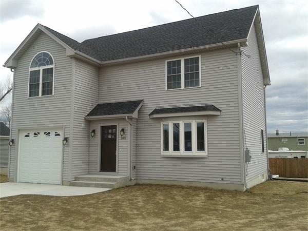 365 Abbott Street Springfield, MA 01118 - Photo 2 of 27 a front view of a house with a balcony