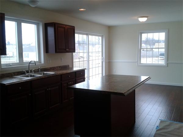 365 Abbott Street Springfield, MA 01118 - Photo 6 of 27 a kitchen with granite countertop a sink granite counter tops and a window
