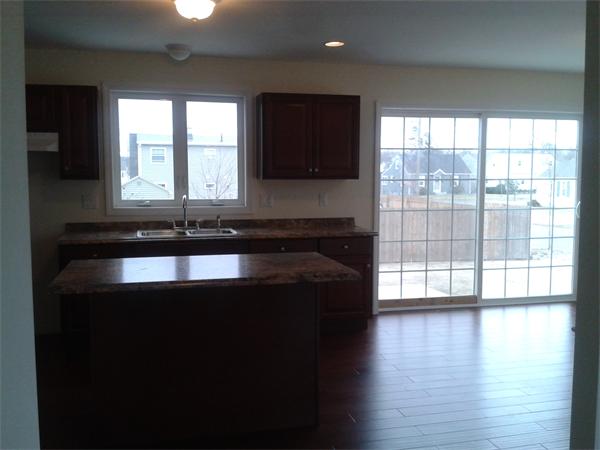 365 Abbott Street Springfield, MA 01118 - Photo 8 of 27 a view of a room with wooden floor and a window