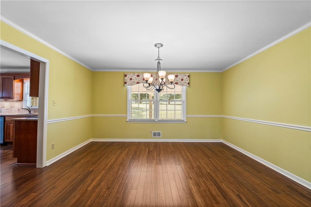 240 Deerfield Road Bogart, GA 30622 - Photo 21 of 80 a view of room with window and wooden floor