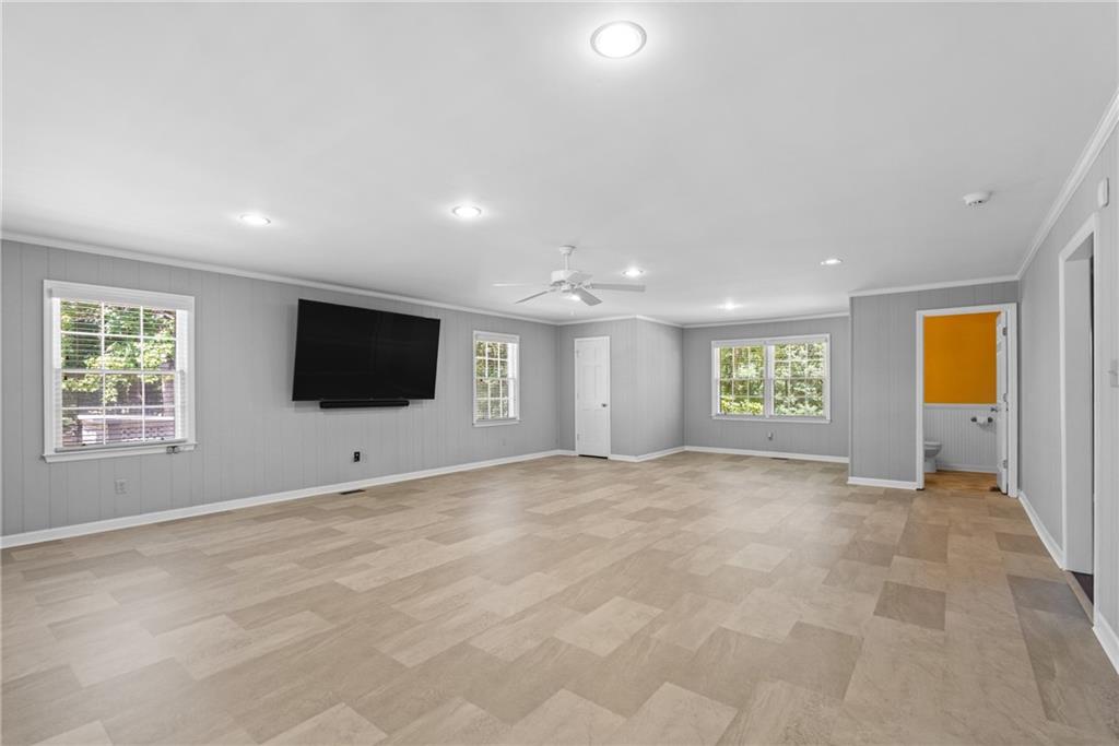 240 Deerfield Road Bogart, GA 30622 - Photo 22 of 80 a view of an empty room with a window and a flat screen tv
