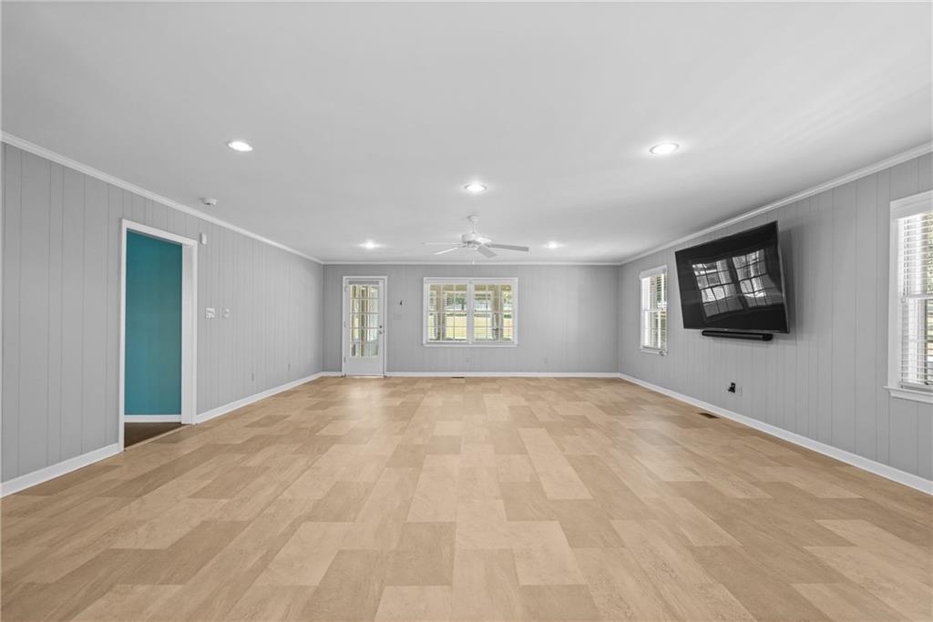 240 Deerfield Road Bogart, GA 30622 - Photo 23 of 80 a view of an empty room with a window and a ceiling fan