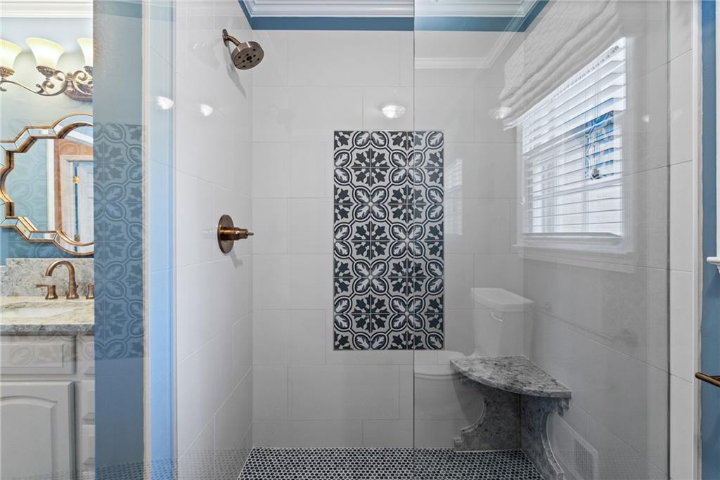 240 Deerfield Road Bogart, GA 30622 - Photo 28 of 80 a bathroom with a granite countertop sink a toilet and shower