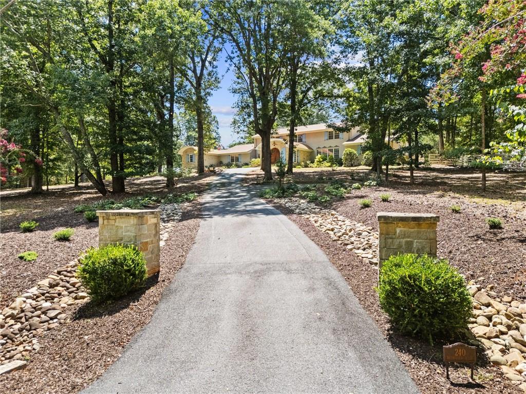 240 Deerfield Road Bogart, GA 30622 - Photo 63 of 80 a view of a park with plants and trees