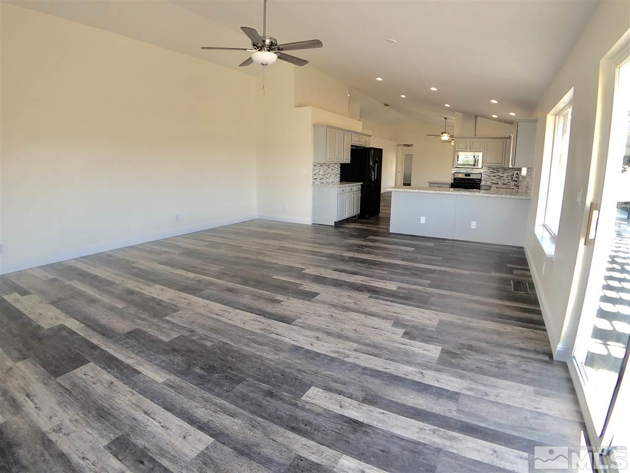 10205 Placerville Road Reno, NV 89508 - Photo 12 of 40 a view of a kitchen with furniture and a kitchen view