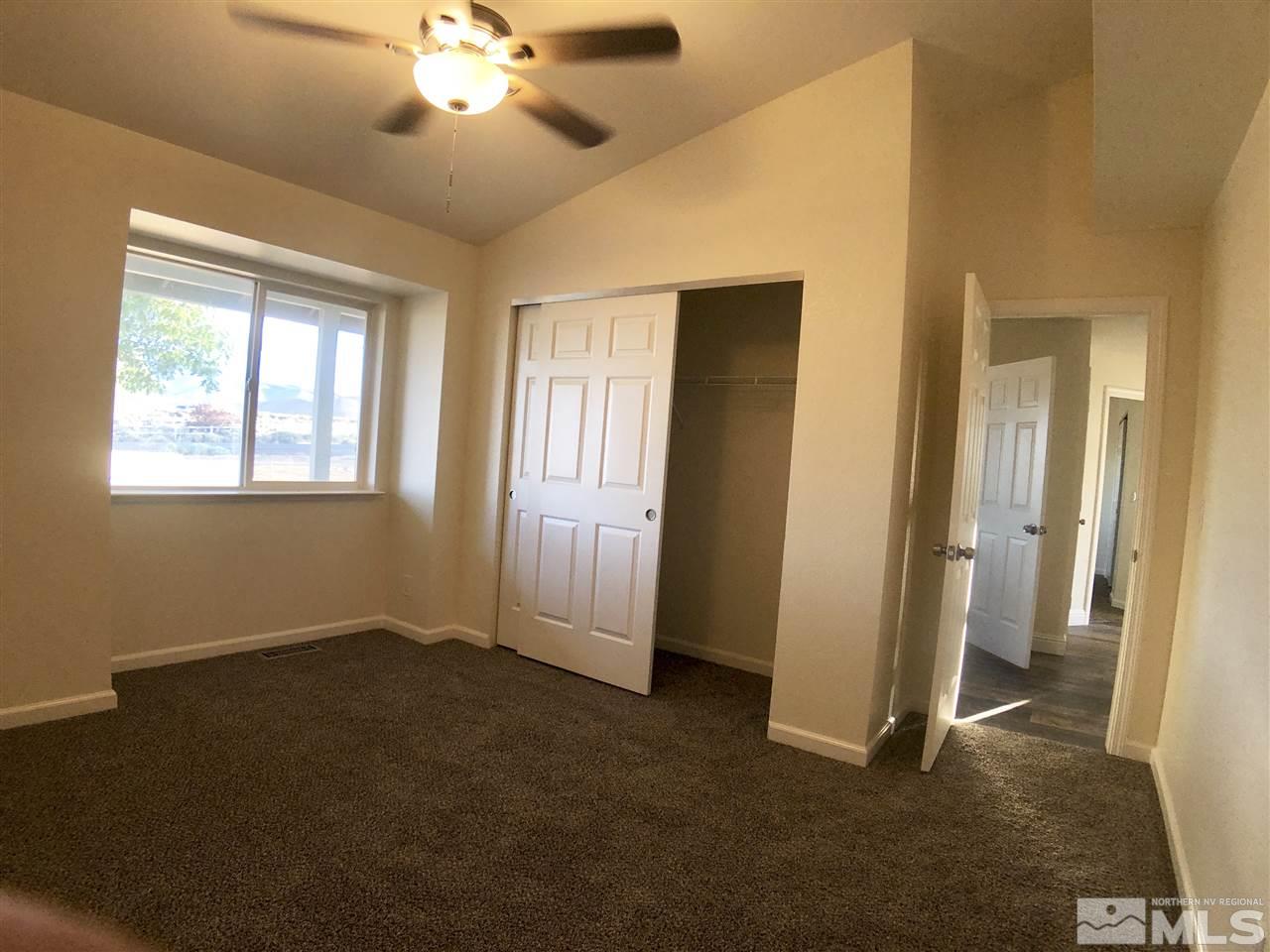 10205 Placerville Road Reno, NV 89508 - Photo 19 of 40 a view of an empty room with a window