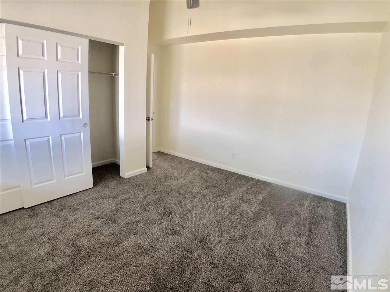 10205 Placerville Road Reno, NV 89508 - Photo 20 of 40 an empty room with windows