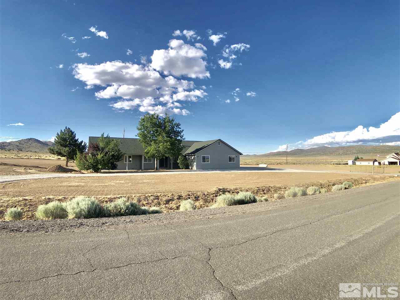 10205 Placerville Road Reno, NV 89508 - Photo 2 of 40 a view of a house with a ocean view