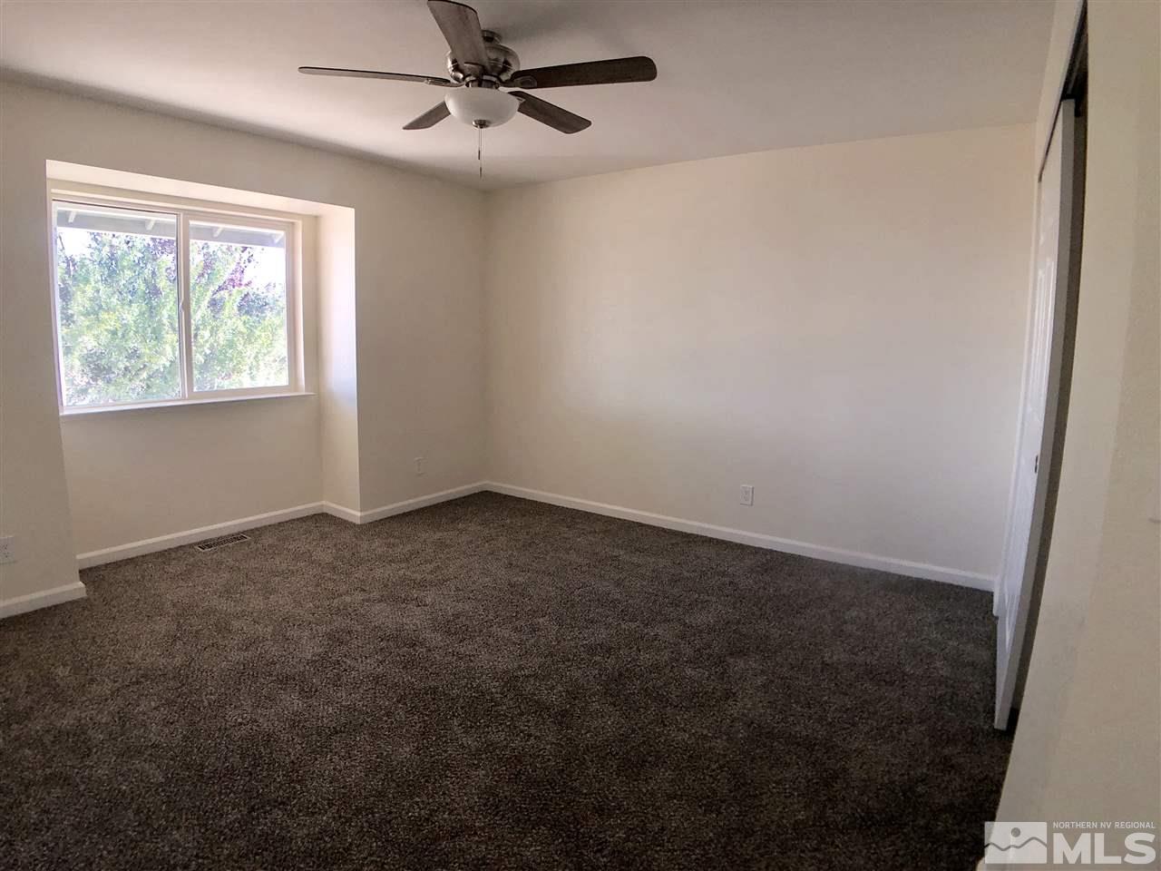 10205 Placerville Road Reno, NV 89508 - Photo 25 of 40 an empty room with windows