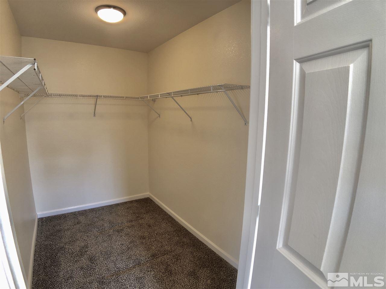 10205 Placerville Road Reno, NV 89508 - Photo 27 of 40 a view of a room with racks on the wall