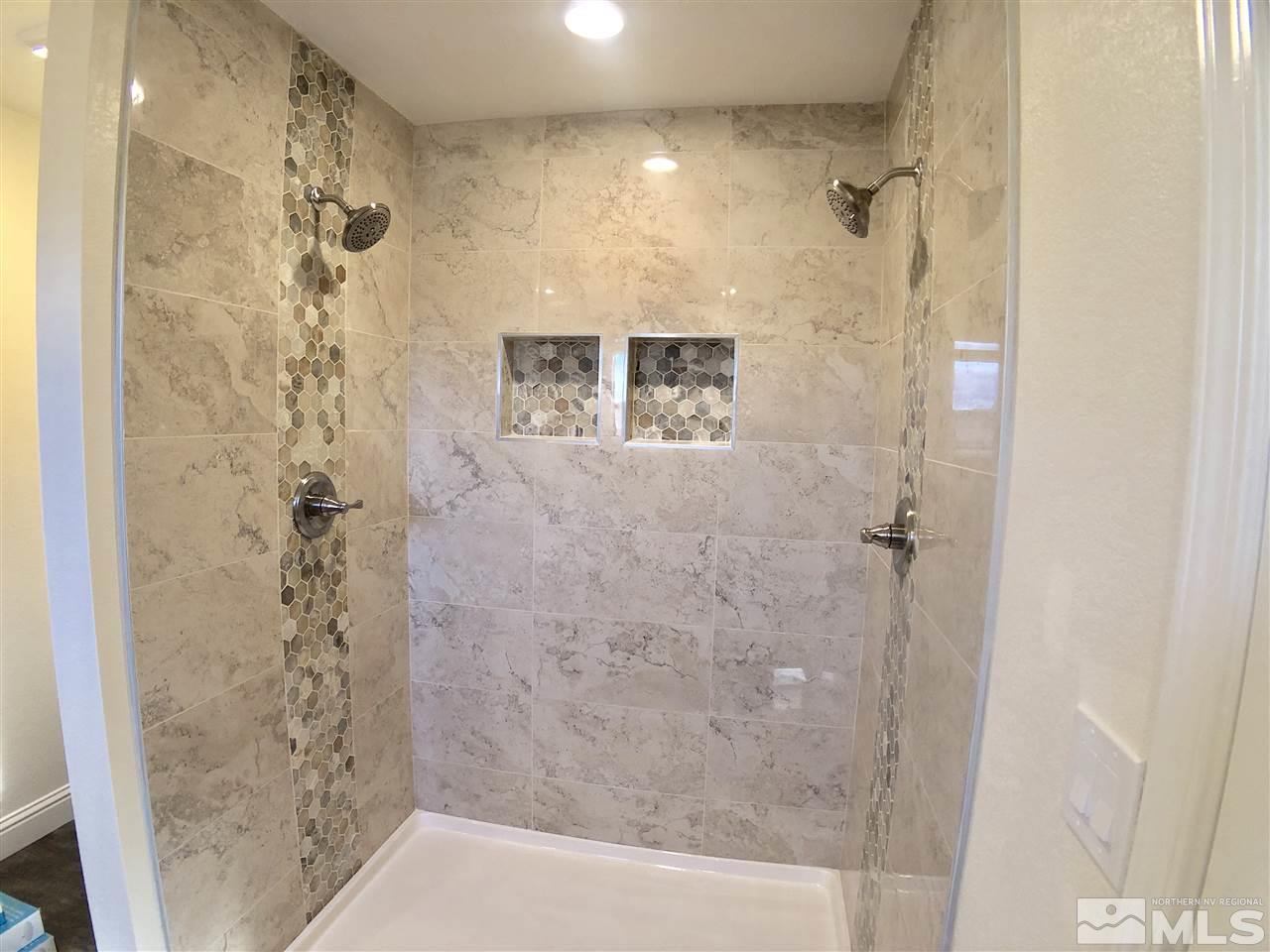10205 Placerville Road Reno, NV 89508 - Photo 31 of 40 a bathroom with a shower