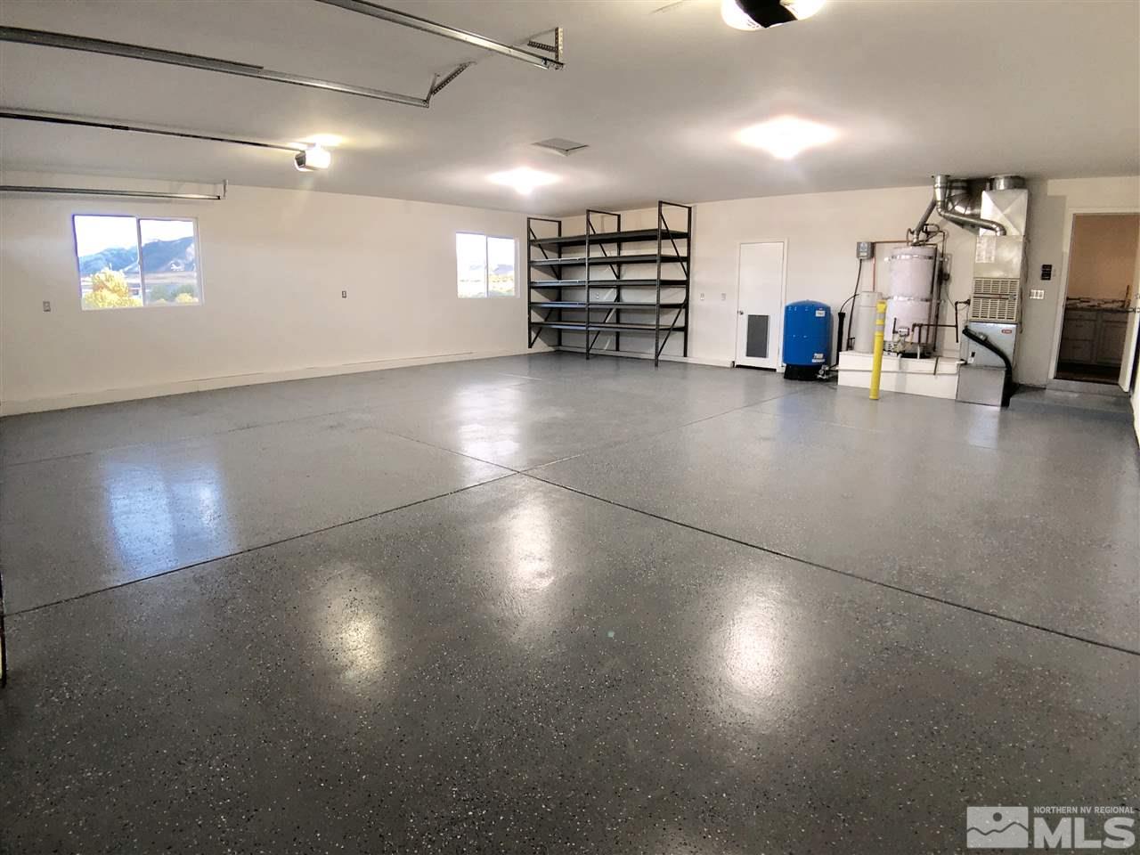 10205 Placerville Road Reno, NV 89508 - Photo 32 of 40 a view of empty room with wooden floor