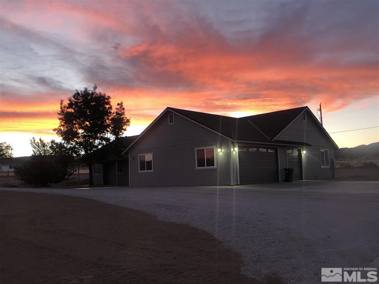 10205 Placerville Road Reno, NV 89508 - Photo 39 of 40 a front view of house with yard and green space