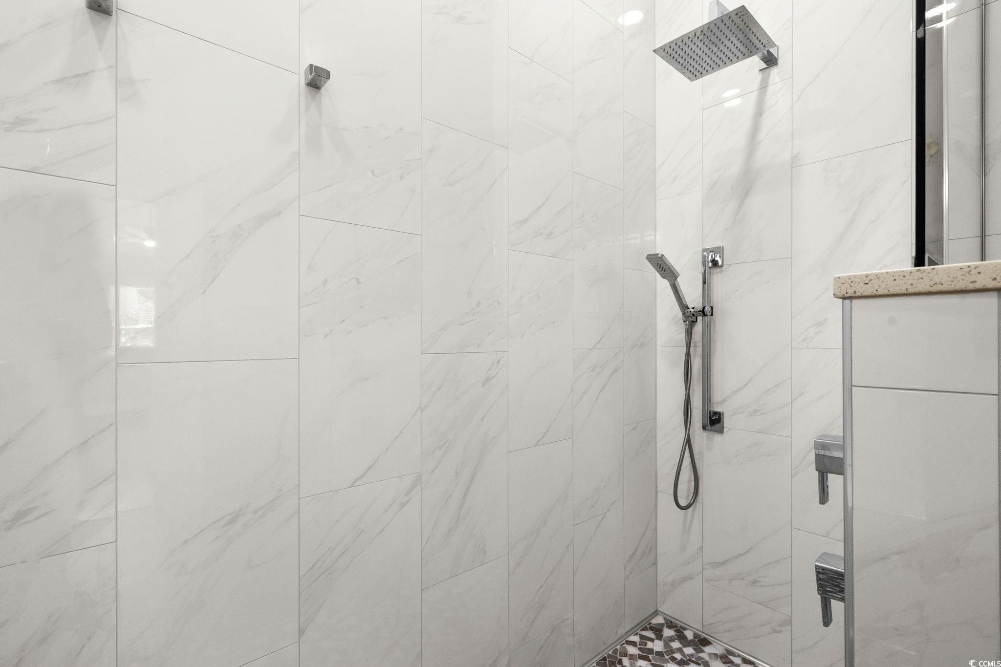 408 Highland Ridge Drive Myrtle Beach, SC 29588 - Photo 24 of 39 Bathroom featuring a tile shower