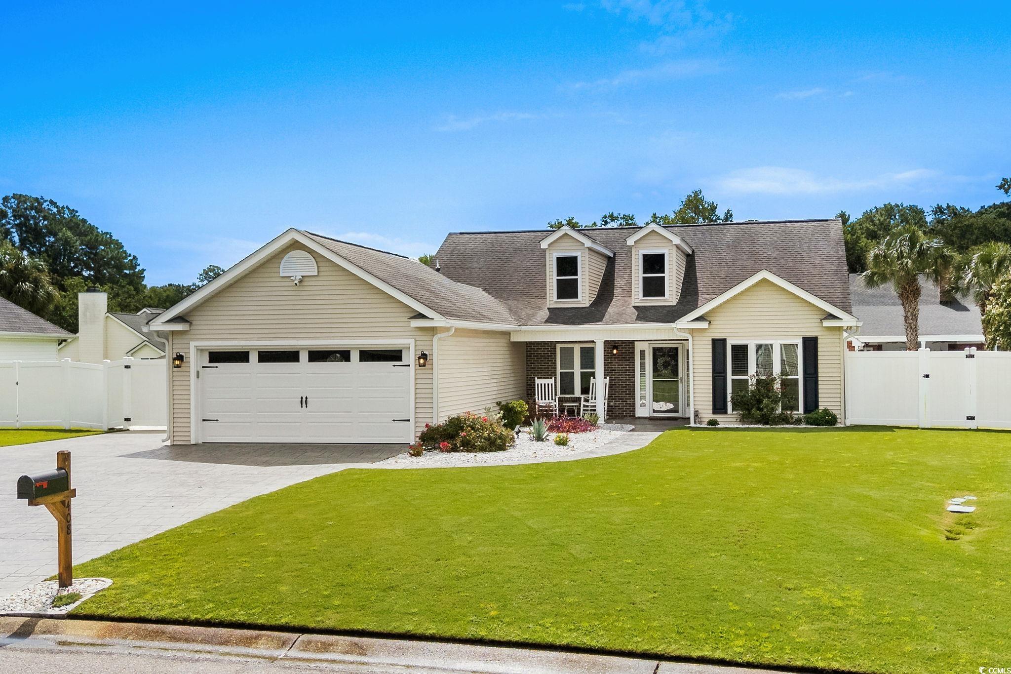 408 Highland Ridge Drive Myrtle Beach, SC 29588 - Photo 34 of 39 Cape cod home with a gate, decorative driveway, a garage, and a shingled roof