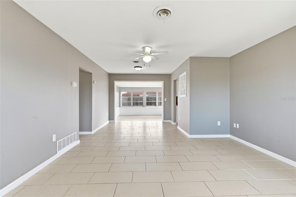 363 Glen Oak Road Venice, FL 34293 - Photo 12 of 53 a view of an empty room with a window