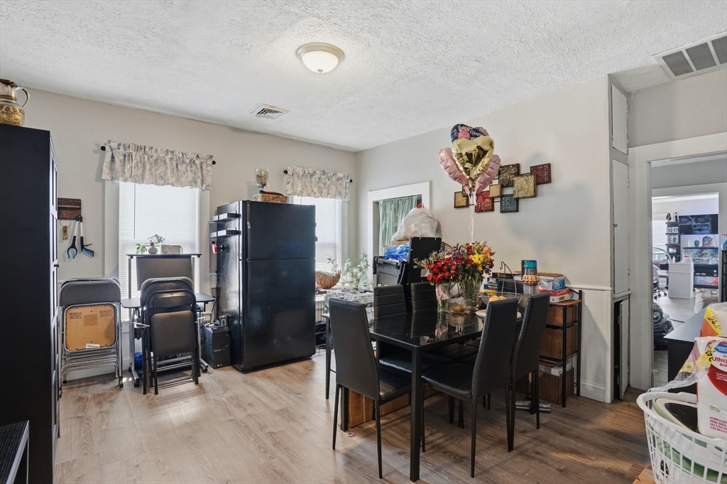 196 Irving Street Fall River, MA 02723 - Photo 23 of 34 a view of a dining room with furniture and chandelier