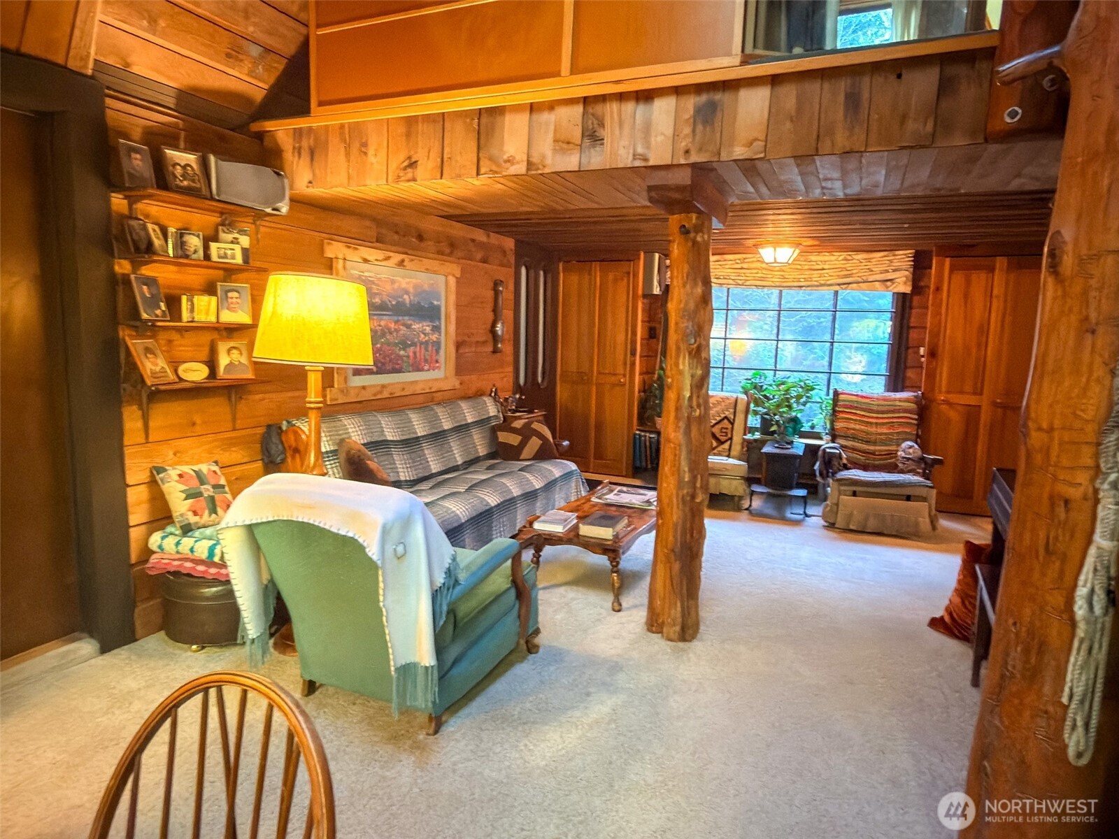 890 Black Bear Road Port Townsend, WA 98368 - Photo 20 of 40 a outdoor living space with furniture and a fireplace