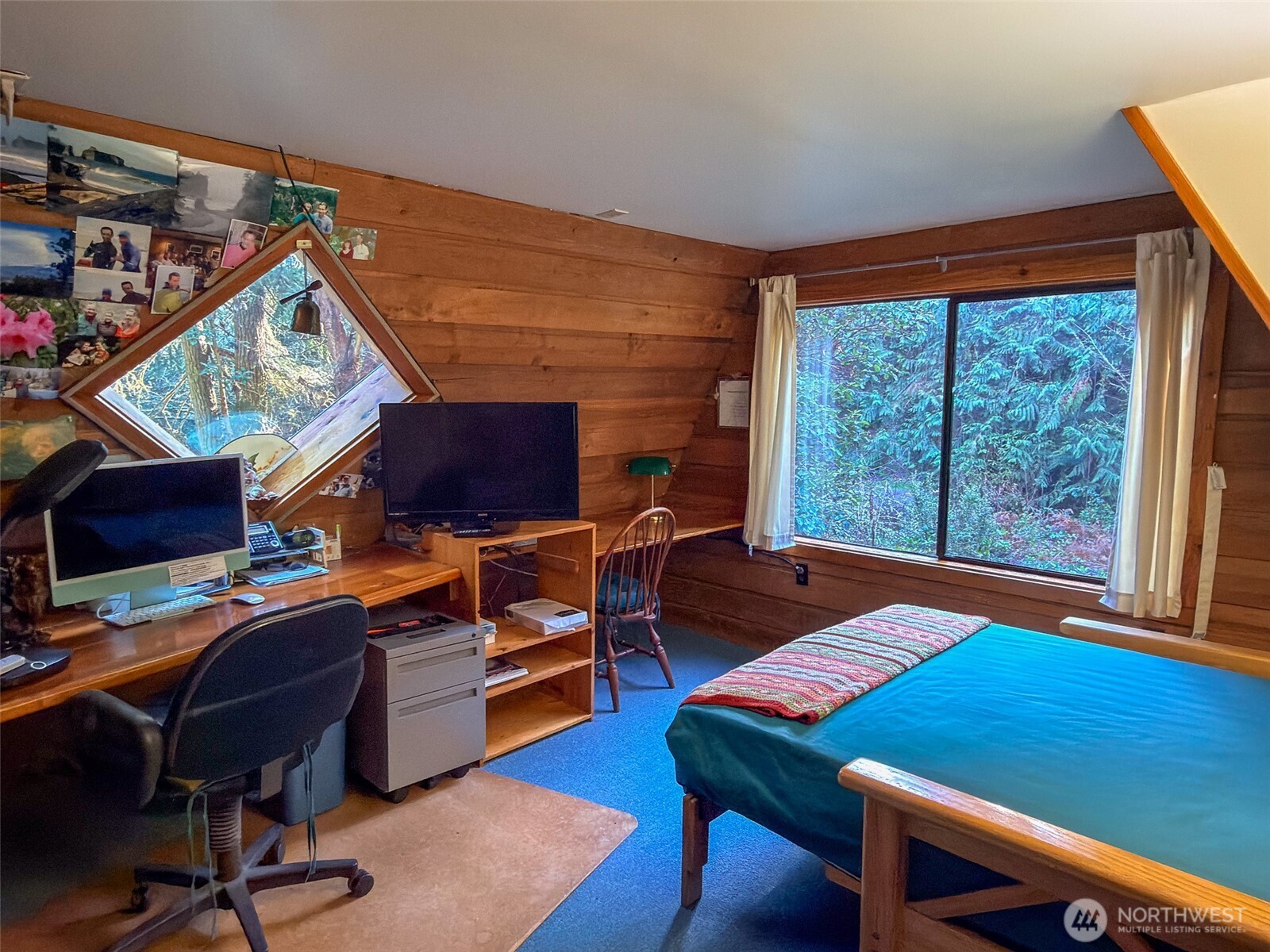 890 Black Bear Road Port Townsend, WA 98368 - Photo 26 of 40 a view of a workspace with furniture and a window