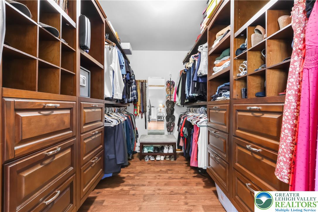 4263 Park Avenue Slatington, PA 18080 - Photo 25 of 54 a view of walk in closet with clothes and shoes