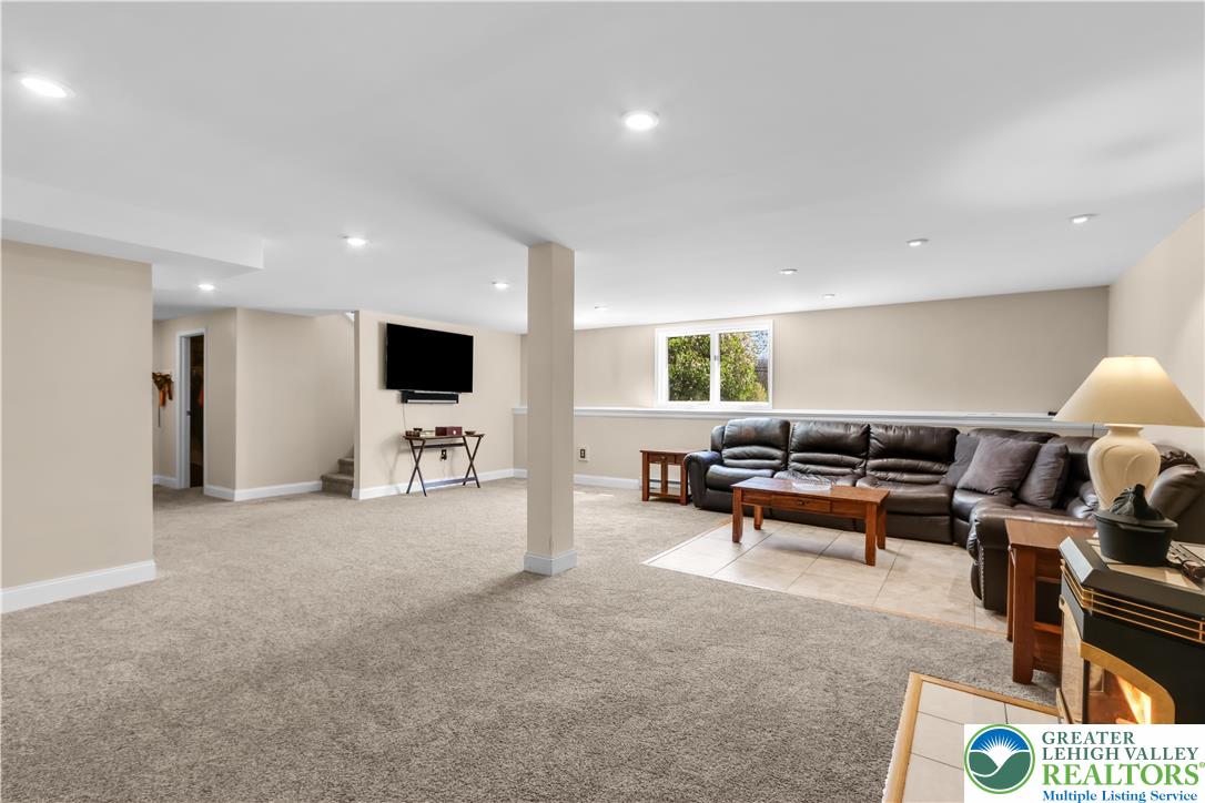 4263 Park Avenue Slatington, PA 18080 - Photo 35 of 54 a living room with furniture and a flat screen tv