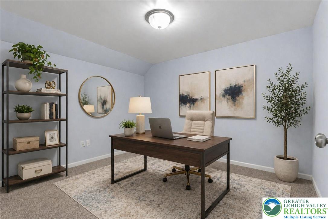 4263 Park Avenue Slatington, PA 18080 - Photo 41 of 54 a view of a workspace with a table and a potted plant