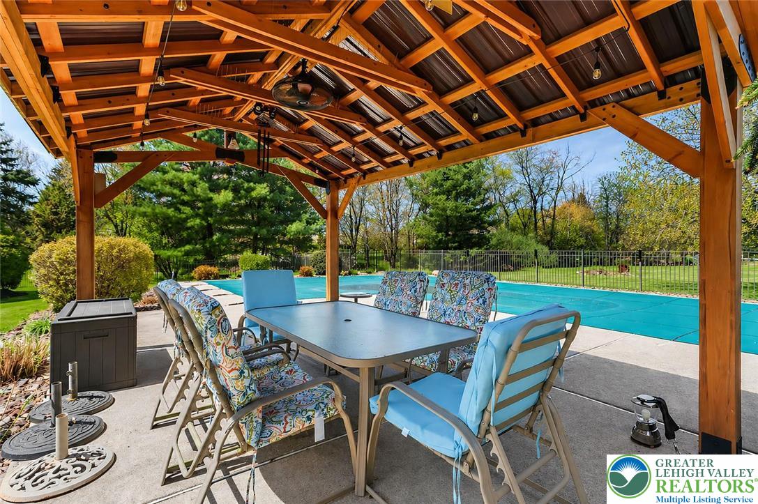 4263 Park Avenue Slatington, PA 18080 - Photo 7 of 54 a patio with a table and chairs